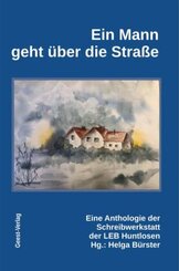 Ein Mann geht &uuml;ber die Stra&szlig;e