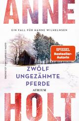 Zw&ouml;lf ungez&auml;hmte Pferde