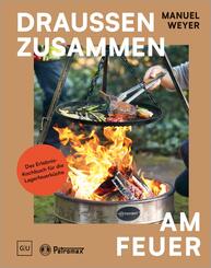 Petromax - Drau&szlig;en zusammen am Feuer